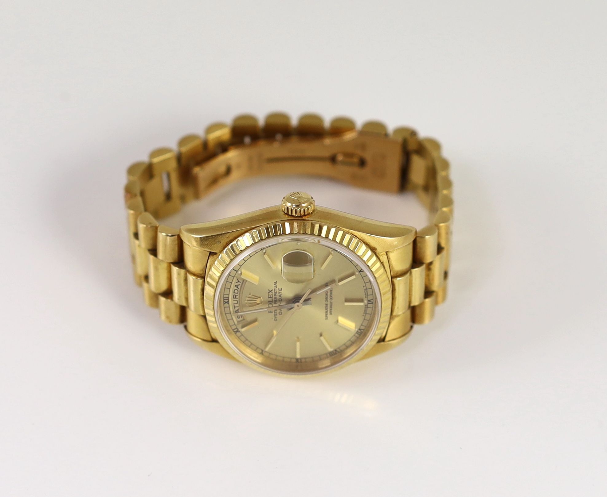 A gentleman's late 20th century 18ct gold Rolex Oyster Perpetual Day Date wrist watch, on an 18ct gold Rolex bracelet with deployment clasp